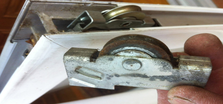 screen door roller repair in Dynes